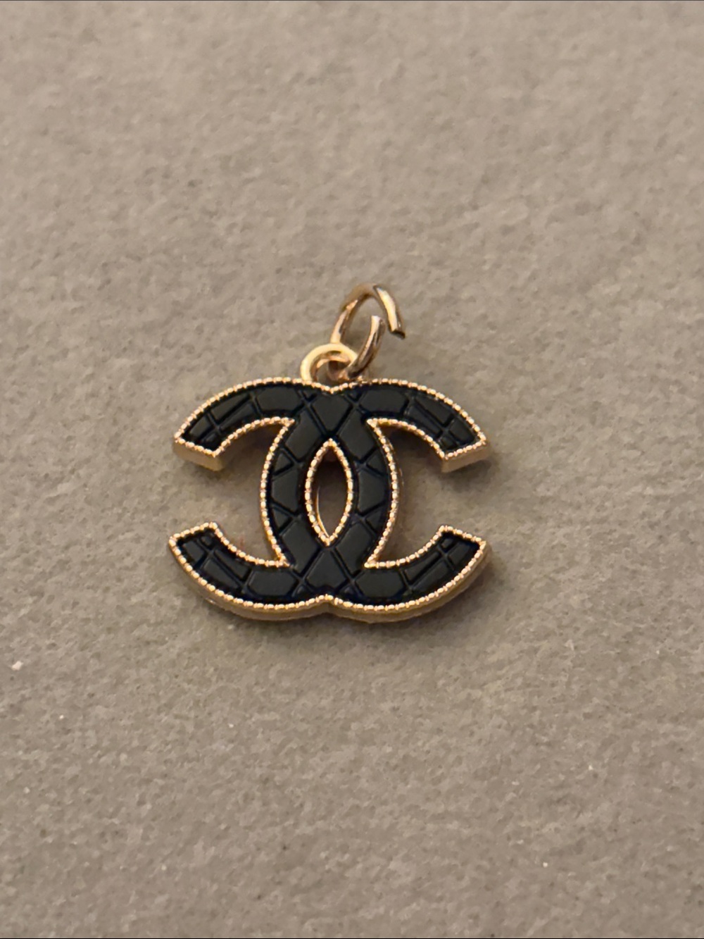 Black and Gold Interlocking CC Charm Pendant